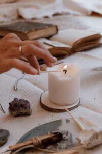 imbolc, imbolc colors, white candle, lighting a candle